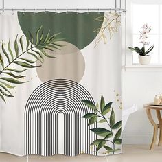 a shower curtain with an abstract design and palm leaves on the outside, in front of a window