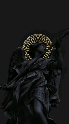 an angel statue is shown against a black background with gold accents on its head and arms