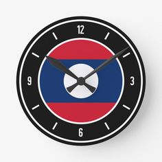 a clock with the flag of the country of north korea on it's face