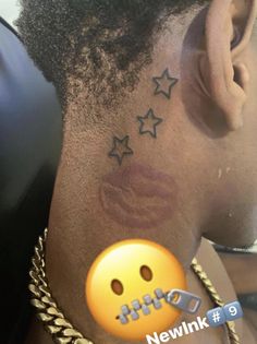 a person with a smiley face and stars on their back side behind the ear,