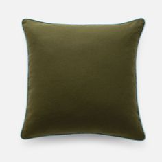 an olive green pillow with blue piping on the front and back, against a white background