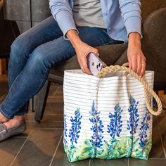 Carry the magical Maine lupine season year-round. 🌸✨ We paired meadow lupines with classic sailor stripes for a look that bursts with coastal charm. 🌺🌿 #FlowerPower #LupineLove Lupine Flowers, Navy Anchor, Sailor Stripes, Tote Outfit, Sustainable Bag, Coastal Charm