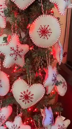 a christmas tree decorated with red and white ornaments