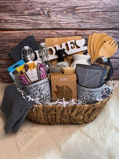 a basket filled with items sitting on top of a bed