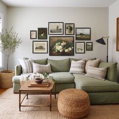 a living room filled with lots of furniture and pictures on the wall above it's coffee table