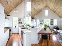 an open concept kitchen and living room with wood floors, vaulted ceilings, white walls, and hardwood flooring