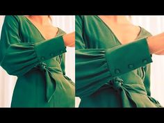 the woman is wearing a green dress and has her hands wrapped around her waist