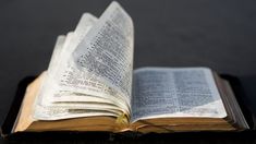 an open book sitting on top of a table