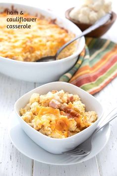 two white bowls filled with macaroni and cheese