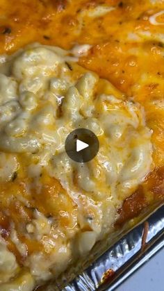 a casserole dish with cheese and sauce on it