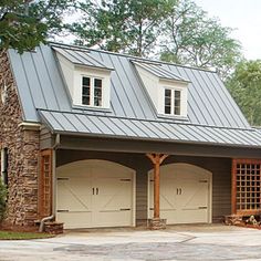 two garages are shown in front of a house