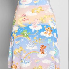 A-Line Skirt Boasts An Exclusive Hand-Drawn Print Of All Your Favorite Care Bears With Blue And Pink Ombre Background! Made From A Soft And Stretchy Viscose-Blend Fabric And Featuring A Comfortable Elasticized Waist, And A Swingy Silhouette, This Darling Mini Skirt Is Always A Sweet Choice! Size Xl Casual High Waist Multicolor Skort, Cute Fitted Multicolor Mini Skirt, Cute Multicolor Lined Skirt, Cute Multicolor Mini Skirt, Playful Multicolor Mini Skirt, Playful Multicolor Skirted Bottoms, Playful Fitted Blue Skirt, Cute Multicolor Skirt, Cute Fitted Multicolor Skirt