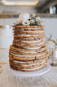 a wedding cake made out of cookies and flowers