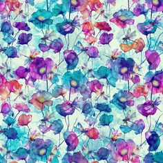 watercolor flowers on a white background with blue and pink petals in the middle,