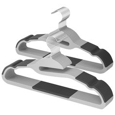 two metal clothes hangers with black and white stripes