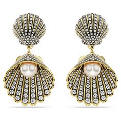 These Idyllia clip earrings deliver the ultimate wave of ocean inspiration. Each gold-tone plated piece features two connecting shell motifs. Each one has been artistically adorned with clear round crystals set in black epoxy, while the dangling shell also includes a luscious white Crystal Pearl at the center. A luxurious way to feel at one with the sea. Couture Jewelry, Earrings Crystal, Jewelry Show, Swarovski Crystal Earrings, Swarovski Earrings, Pearl Shell, Swarovski Jewelry, Ocean Inspiration, White Crystal