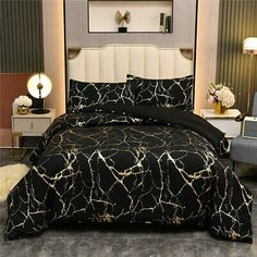 black and gold comforter set with white pillows