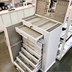 an open drawer in the middle of a store