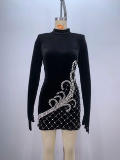 Introducing the Trend4us Women’s Luxury Beaded Crystal Velvet Long Sleeve Dress—an epitome of elegance and sophistication. This stunning black velvet mini dress features exquisite beaded crystal embellishments, a figure-flattering silhouette, and long sleeves that exude timeless charm. Perfect for evening events, weddings, gala parties, and cocktail gatherings, this dress ensures you stand out with unmatched grace and allure. SPECIFICATIONS Elasticity: Non Stretch Sleeve Style: regular Fabric Ty Long Sleeve Gloves, Sleeve Gloves, Heavy Dresses, Long Sleeve Velvet Dress, Dress Luxury, Nightclub Party, Crystal Fashion, Stretch Velvet, Mini Velvet Dress