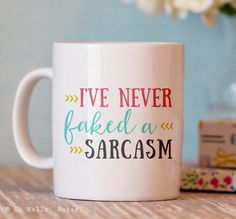 a white coffee mug with the words i've never baked a sarcasm on it