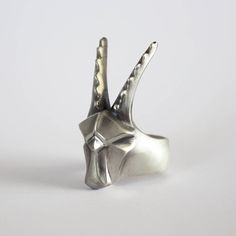 Long horn goat, a Capricorn ring, Inspired by the Capricorn zodiac sign. Sculptured with two long horns and geometric fierce face. Made of solid sterling silver, Unisex. Measurements: 13.7 cm X 1.5 cm Band height: 0.8 cm Weight: 13.5 gr Goat Accessories, Goat Ring, Goat Jewelry, Capricorn Ring, January Born, Capricorn Jewelry, Long Horns, Capricorn Gifts, Capricorn Zodiac Sign