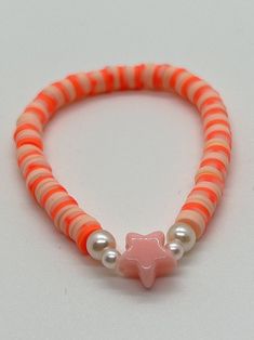 Handmade 7 in. preppy beaded bracelet. Contains orange, coral, and beige  6mm clay beads. Also has pearl beads, and a cute turtle bead!! This is a super cute peachy/orange bracelet or summer bracelet! It's perfect for a gift for yourself or anyone else!!  I can custom create any jewelry for you. Just let me know what colors you want, and if you want a word on it or not. I can also make phone charms and rings, and necklaces. Fall Braclets Clay Bead, Bracelet Clay, Beige Bracelet, Beaded Braclets, Summer Bracelet