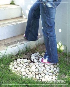 two people standing on steps with their feet in the ground and one person wearing pink shoes