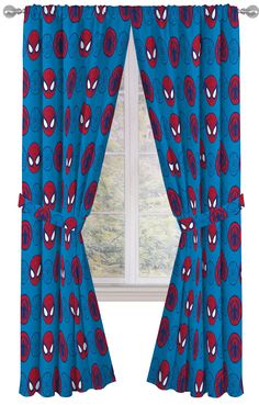 the curtains are open and ready to be hung in front of the window with spiderman faces on them