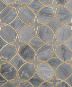 an artistic tile design in grey and gold