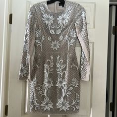 Very Elegant Dress In Excellent Condition New Without Tag,All Beads. Great For Wedding Or Any Special Occasion. Elegant Spring Sequin Lace Dress, Elegant Spring Lace Sequin Dress, Elegant Lace Sequin Dress For Spring, Holiday Sequined Mother Of The Bride Wedding Dress, Holiday Sequined Mother Of The Bride Dress For Wedding, Glamorous Lace Long Sleeve Mother Of The Bride Dress, Glamorous Long Sleeve Lace Mother Of The Bride Dress, Elegant Wedding Mini Dress With Pearl Embroidery, Glamorous Fitted Embroidered Dress