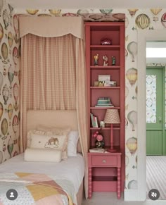 a bedroom with pink and green accents