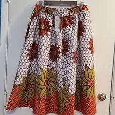 Nwt African Print Skirt Size Large. Skirt Has An Elastic Waist And Two Pockets On Each Side. Please Look At Pictures For Measurements. Colorful And Comes From A Pet Free And Smoke Free Home. Yellow Full Flowy Skirt, Yellow Flowy Full Skirt, Orange Relaxed Flared Skirt, Orange Lined Midi Skirt, Yellow Full Maxi Skirt For Spring, Yellow Flowy Flared Maxi Skirt, Flowy Flared Yellow Maxi Skirt, Flowy Flared Orange Skirt, Yellow Relaxed Flared Maxi Skirt