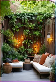 an outdoor seating area with plants and lights