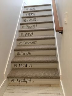 a stair case with the words be grateful written on it in black and white lettering