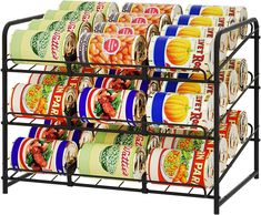 four tiered display rack with canned food on it