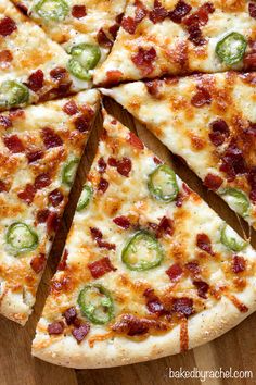 a pizza with pepperoni, jalapenos and cheese cut into eight slices