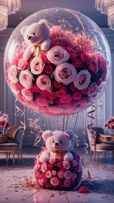 two teddy bears sitting on top of a large balloon filled with roses and other flowers