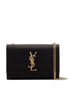 Black leather small Kate leather shoulder bag from SAINT LAURENT featuring grained texture, signature YSL logo plaque, internal logo patch, internal logo stamp, gold-tone hardware, foldover top, magnetic fastening, chain-link shoulder strap, main compartment and internal slip pocket. | Saint Laurent small Kate leather shoulder bag Sac Yves Saint Laurent, Camel Leather Bag, Ysl Kate, Kate Bags, Saint Laurent Handbags, Ysl Logo, Yves Saint Laurent Bags, Shoulder Bag Black, Leather Cap