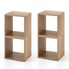 two wooden cubes sitting side by side on a white surface