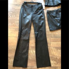 This Price Is For The Pant Only! New Tags Supple Napa Leather Lined Flare Leg Mid Rise Lace Up Pant. 8” Invisible Side Zip Metal Grommet Leather Lace Up Front Opening Adjust Fit Waist. Waist Band 3”Wide. The Rise In Front Is 9 1/2” The Rise In The Back Is 14 1/4”. The Waist Is 28 1/2” As Pictured The Hips Are 38-39” Leg Opening At Hem Is 18 1/2”. Inseam 34”With A Raw Edge Hem May Be Cut Off Or Glued Up To Shorten. Real Leather No Damage Non-Smoker No Pets. C Separate Listings 4 Matched Skirt Sol High Waist Fitted Leather Pants For Formal Occasions, Designer Fitted Wide Leg Bottoms, Designer Fitted Black Leather Pants, Fitted Leather Pants For Formal Occasions, Designer Fitted Wide Leg Pants, Formal Fitted Leather Pants, Designer Black Leather Bottoms, Designer Fitted Bottoms For Formal Occasions, Designer Fitted Formal Bottoms