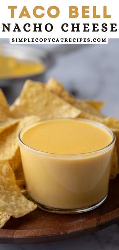 a bowl of taco bell nacho cheese dip surrounded by tortilla chips