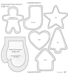 paper cut outs with the shapes used to make gingerbread cookies