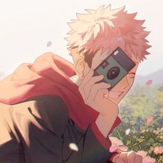 an anime character taking a selfie with his cell phone in front of some flowers