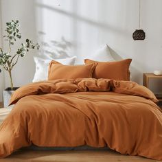 PRICES MAY VARY. 【King Size Package Includes】3 Pieces Washed Linen Cotton Blended Duvet Cover Set:1 Duvet Cover （104"x 92"),2 Pillowcases (20" x 36"). Note: Duvet insert and pillows are not included. 【Fabric Feature】Made of 55% Linen and 45% Cotton Fabric. Our Luxury linen blended duvet cover set retains rich texture of Linen, with soft touch and washed style. It has better moisture absorption and breathability than cotton fabric, which can ensure that you feel cool in summer and warm in winter. Rust Bedroom, Brown Duvet Covers, Brown Comforter, Orange Comforter, Bedding Comforter Sets, King Size Comforter Sets, Colorful Comforter, Orange Bedding, Bedding Comforter