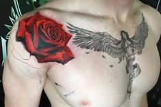 a man with a rose tattoo on his chest and wings around his arm, next to a red rose