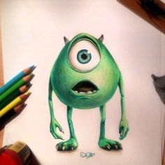 a drawing of a green monster with big eyes