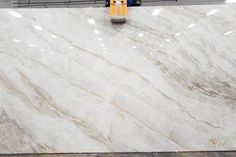 a large white marble slab in a warehouse