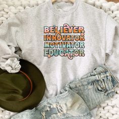 Floral Believer Motivator Educator Sweatshirt. HOW TO ORDER T-SHIRT 1- Please, Check and Review all Photos. 2- Choose your size from the drop-down menu 3- Select Your Shirt Color from Drop-down 2 4- Repeat for each shirt ordered 8 oz.(US) 13.5 oz.(CA), 50/50 preshrunk cotton/polyester Heather colors- 90/10 airlume combed and ringspun cotton/polyester Deep Heather Grey- 3.6 oz., 65% Polyester/35% Ring-Spun cotton Double-lined hood with color-matched drawcord Double needle stitching at shoulder, a Positive Clothes, Chicken Shirt, Teacher Sweatshirt, Womens Sweatshirts, Chicken Shirts, Funny Chicken, Animal Sweatshirt, Sweatshirt Short Sleeve, Farm Animal