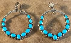 Big Beautiful Turquoise Hoop Earrings  Made by Eloise Kee, Navajo  They measure 3 inches top to bottom (including the tops) 2 inches across  Together they weigh 15 grams Turquoise Hoops, Turquoise Hoop Earrings, Silver Turquoise, Turquoise Sterling Silver, Jewelry Earrings Dangle, Etsy Earrings, Dangle Drop Earrings, Hoop Earrings, Dangle Earrings