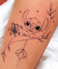 a small tattoo on the leg of a woman